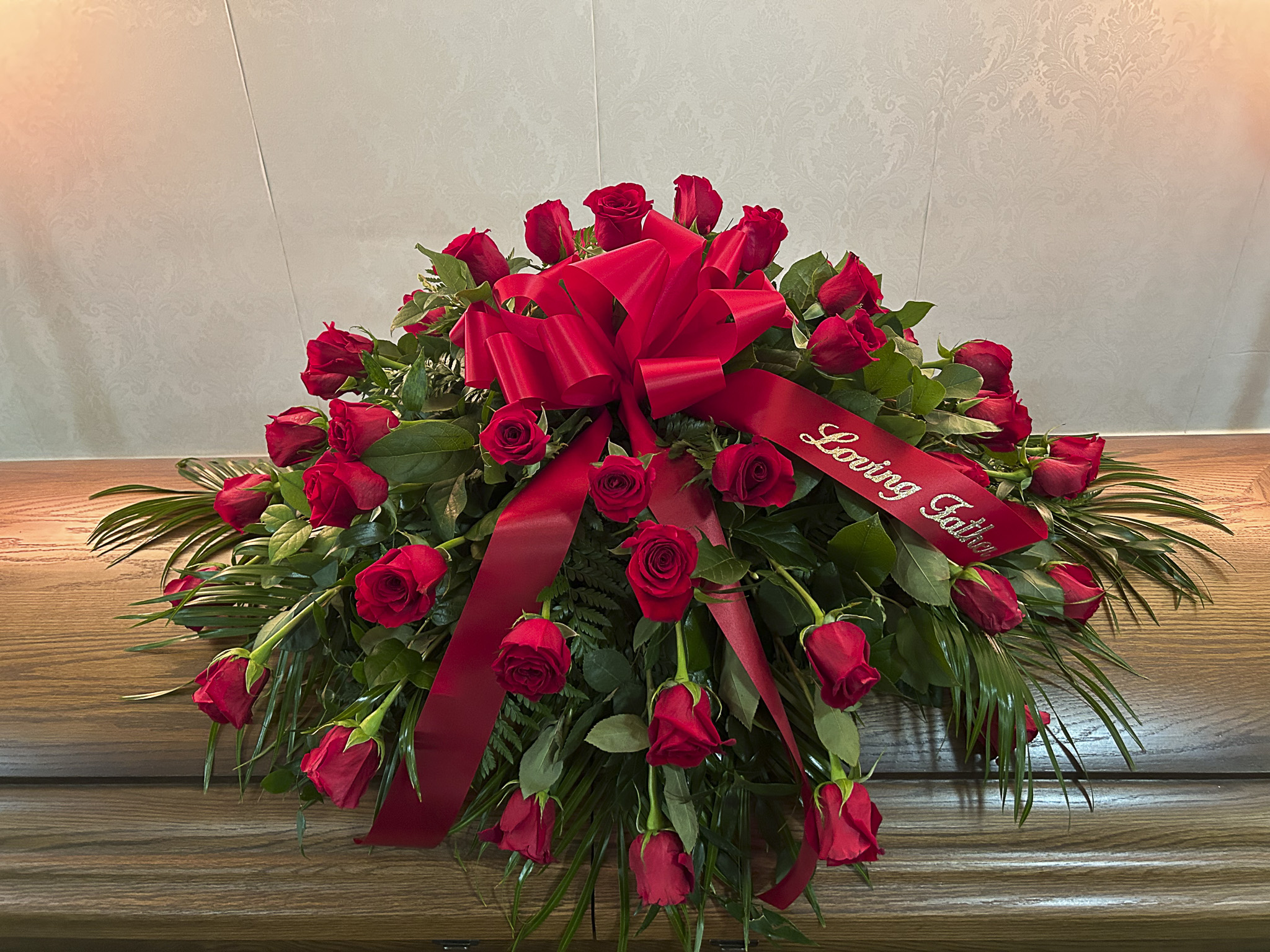 Ruby Remembrance – Casket Spray (All Red Roses)